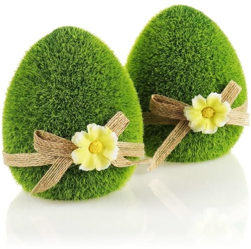 com-four® 2X Dekofigur - Osterei mit Schleife und Blumen - grüne Deko-Figuren für Frühling und Ostern - Keramik-Eier mit Kunst-Gras überzogen - Osterdeko (2 x Ei - 11cm)