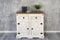 SAM Kommode Cancun, Pinienholz massiv, Sideboard mit 2 Türen & 2 Schubladen, weiß lasiert, Schwarze Metallgriffe, honigfarbene Deckplatte