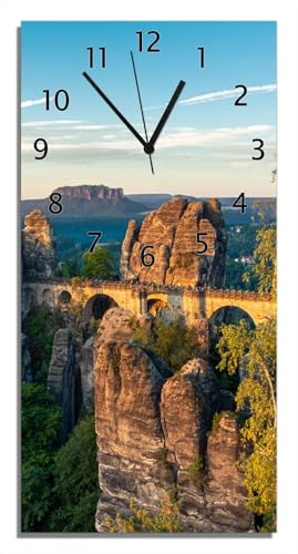 Wallario Design-Wanduhr Steinerne Brücke in der Landschaft aus Glas, Motiv-Uhr Größe 30 x 60 cm, Schwarze Zeiger