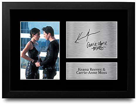 HWC Trading FR A4 Keanu Reeves Carrie-Anne Moss The Matrix Neo, Trinity Geschenke Gedruckt, Signiert Autogramm Bild Für Film-Erinnerungsstücke-Fans - A4 Framed