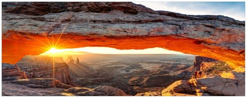 Wallario Küchenrückwand selbstklebend 115 x 50 cm, Motiv: Sonnenstrahl am Horizont Leuchtende Felsspalte | Spritzschutz abwischbar & pflegeleicht