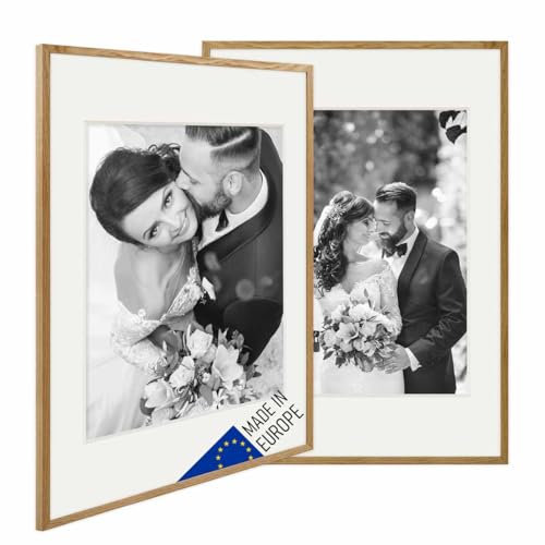 PHOTOLINI Cadre photo en bois véritable 50 x 70 cm avec passe-partout 40 x 50 cm chêne, fabriqué en UE, lot de 2, verre acrylique, à suspendre, avec accessoires - pour photos & images