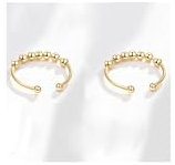 Genérico Juego De 2 Anillos Anti-Estrés De Acero Inoxidable, Diseño Giratorio Ajustable, Unisex, Dorado Y Moderno