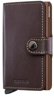 Secrid Le MiniWallet a une taille compacte, mais il a une capacité étonnante. Le revêtement en cuir extérieur peut contenir des billets, des reçus et des carreaux, tandis que dans le Cardprotector in