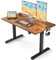 FEZIBO Height Adjustable Electric Standing Desk, 120 * 60 cm Stand up Table, Sit Stand Home Office Desk with Splice Board, Black Frame/Rustic Brown Top