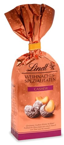 Lindt Schokolade | Weihnachts-Cashews | 100g | Cashews in Vollmilch-Schokolade mit einem Hauch von Zimt und Koriander | Schokoladengeschenk zu Weihnachten