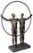 GILDE 37592 - Escultura para Parejas de Dos Hombres, Color Bronce en círculo sobre Base Negra, 35,50 x 27 x 8 cm