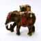 Elefant mit Gepäck aus Polyresin. Handbemalt. 12,5 cm hoch. Krippenfigur.