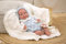 ARIAS - 40 cm Reborn Ian Puppe mit weißer Decke, Baby mit Vinylkörper, Blonder Pelz, weißer und rosa Kleidung, Schnuller und Schnuller, Spielzeug für Kinder ab +3 Jahren (ARI98142)