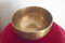 Hand Beaten Tibetan Buddhist Singing Bowl; 5.5in Diameter; Average weight 556g. Produced in Nepal. Playing Stick included by Spiritual Gifts