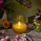 LED Windlicht Echtwachs Kerze im Glas flackernd Timer mit Batterie H: 9,5cm (Gelb)