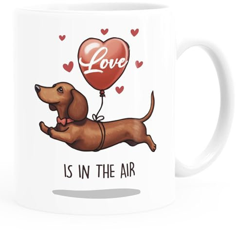 Moonworks® Kaffee-Tasse Liebe Lustig Geschenk Mann Frau Spruch Love is in the Air Hund Dackel Luftballon weiß standard