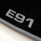 Autoteppich-Stylers ATS_Q300_E91-502 Passgenaue Velours Fußmatten mit Logo Stick (E91) und Rand in Silbergrau