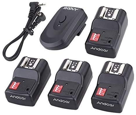 Andoer 16 Canali Wireless Remote Flash Trigger 1 Trasmettitore + 4 Ricevitori + 1 Cavo di Sincronizzazione per Canon Nikon Pentax Olympus Sigma Sunpak Vivitar Neewer YOUNGNUO Speedlite