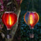 Festive Lights - 45cm Solar Power Red & Rainbow Stain Cool Fiesta Realistic Flame Outdoor Hanging SMD LED Hot Air Balloon Lanterns - Multicoloured Glass Effect Flaming Garden Lights with Handles