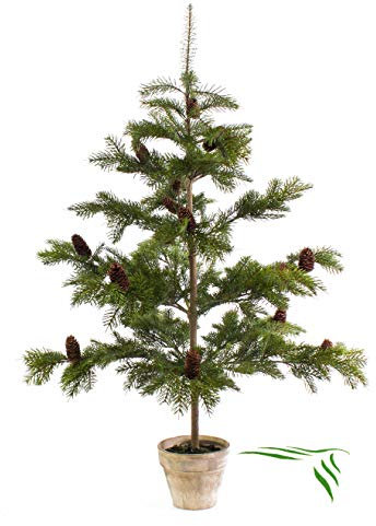 artplants.de Künstlicher Nordmann Tannenbaum im Topf, Zapfen, 135cm - Kunsttanne