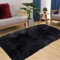 SXYHKJ Faux Lammfell Schaffell Teppich Lammfellimitat Teppich Longhair Fell Optik Nachahmung Wolle Bettvorleger Sofa Matte (50 x 150 cm- Rechteck, Schwarz)