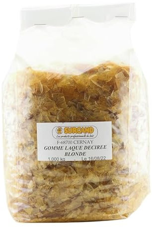 GOMME LAQUE EN PAILLETTES SUPER DECIREE BLONDE / Gomme laque de grande qualité, incolore-miel, pour fabriquer soi-même les vernis tampon traditionnels à grand brillant. (1 KG)