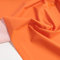 TOLKO Outdoor-Stoff Wasserdicht gummiert | strapazierfähiger Friesennerz | NylonStoff als Meterware | für Regenjacke Plane Regenschutz (Orange)