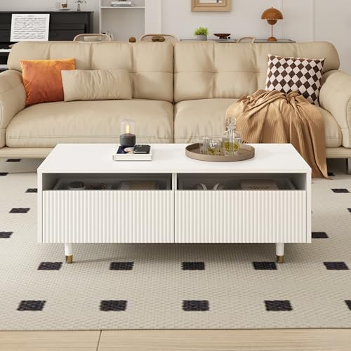 Dieser moderne LED-Couchtisch verfügt über eine gewellte Schubladenplatte, gold-weiße Beine, zwei Schubladen und einen farbwechselnden LED-Lichtstreifen. Ein passender TV-Schrank ist ebenfalls erhältl