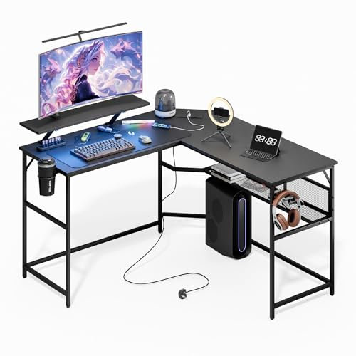 Mondeer L Shaped Gaming Desk, 130 x 130 cm Computer Desk with LED Lights 2 Power Outlets and 2 USB Ports, Reversible Corner Desk with Storage Shelf, for Home Office Bedroom, Black