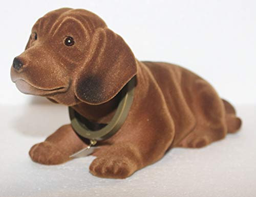 RAKSO Wackel Dackel Figur Hund Dackel Wackelfigur H 14 cm groß liegend mit Wackelkopf