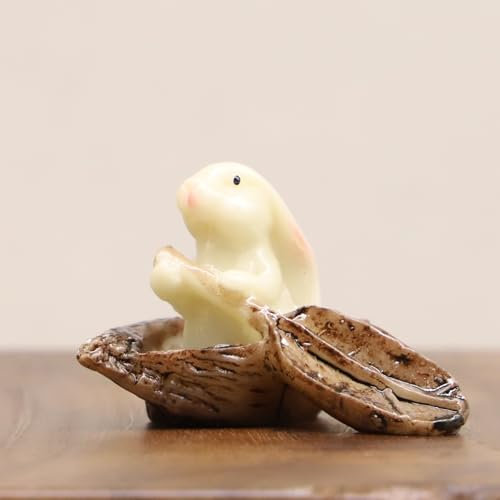 Bateau miniature pour maison de poupée avec pagaie dans un bateau, mini lapin assis dans un bateau en coquille, pour jardin féérique, terrarium, diorama ou mini jardinage, décoration de forêt