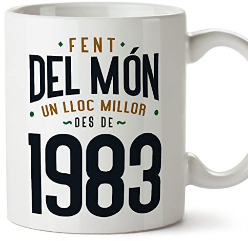 Mugffins Tassen/Becher mit Spruch 1983 Geburtstag - Auf katalanisch - Fent del Món un Lloc Millor - 11 oz / 330 ml - origenelles und lustiges Geschenk