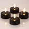 ZIYOUDOLI Lot de 4 bougies chauffe-plat LED solaires d'extérieur étanches avec fonction minuterie et scintillement blanc chaud 6 x 6 cm (costume noir) Convient pour une utilisation dans le jardin, le