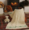 SAOL Irische Babydecke aus Merinowolle mit Schaf und Kleeblattmuster