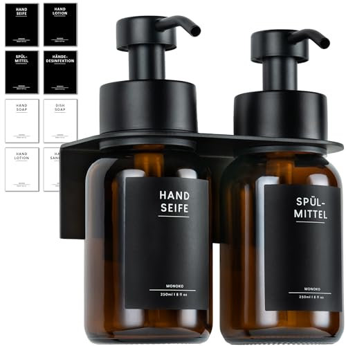 MONOKO | Glas Seifenspender Wandbefestigung ohne Bohren | Wandhalterung Spülmittelspender Küche | Seifenspender braun selbstklebend | 250ml mit Edelstahl Pumpspender