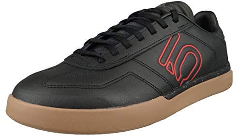 adidas Herren Sleuth DLX Leichtathletik-Schuh, Kern Schwarz/Scarlet/Gum M2, 42 2/3 EU