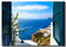 Leinwandbild Window View Santorini Griechenland | Fensterblick | 70 x 100 cm Querformat | Bild auf Leinwand | Insel Meer Aussicht Blumen Berge | Einrichtung | modern elegant | Wohnzimmer Schlafzimmer