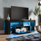 SONNI Mueble TV con Luz LED Ajustable de 12 Colores Sálon Negro con Mando a Distancia, Mesa TV Madera con Estantes Cristal 140 CM