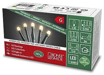 Konstsmide Micro LED Lichterkette, gefrostet, verschweißt, 50 bernsteinfarbene Dioden, 30V Innentrafo, dunkelgrünes Kabel - 6343-820