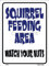 Parkschild mit Eichhörnchen Feed Area Watch Your Nuts aus Metall