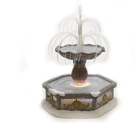 Villaggio di Natale luminoso La fontana