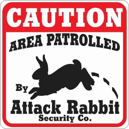 Animal Den Schild mit Hasenangriff.
