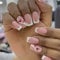 GlamRays 24 morceaux autocollants ongles carrés courte longueur brillant acrylique courts faux ongles avec bandes blanches et motifs de cœur rouge