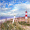 Wallario Design-Wanduhr Leuchtturm am Strand von Sylt aus Glas, Motiv-Uhr Größe 20 x 20 cm, weiße Zeiger