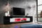 Komodee, Merano Bank TV Schrank, Schwarz Weiss Schwarz, LED RGB, Breite 230 cm x Höhe 52,5 cm x Tiefe 35 cm, für Wohnzimmer, Schlafzimmer