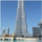 Wallario Glasbild Wolkenkratzer in Dubai - 55 x 55 cm Wandbilder Glas in Premium-Qualität: Brillante Farben, freischwebende Optik