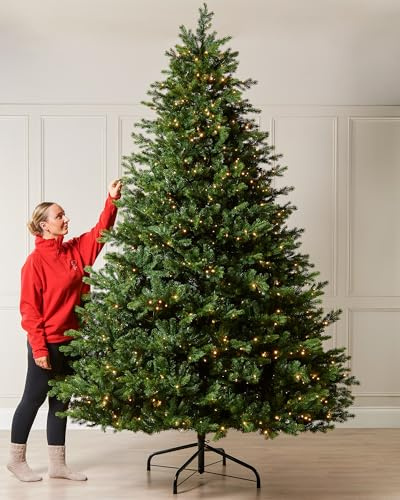 WeRChristmas 9ft Pre-Lit Balsam Fir Christmas Tree | 6426 Mixed PE & PVC Tips, 1000 Warm White LEDs, 177.8cm Diameter, Hinged Branches, Metal Stand, 2.7m Tree