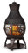 Blumfeldt Titus - Cheminée de Jardin, Poêle de Patio, FireView 360°, Aspect Antique, en Fonte, Inoxydable, Support sécurisé, Grille de Charbon de Bois, tisonnier et Porte grillagée, Noir