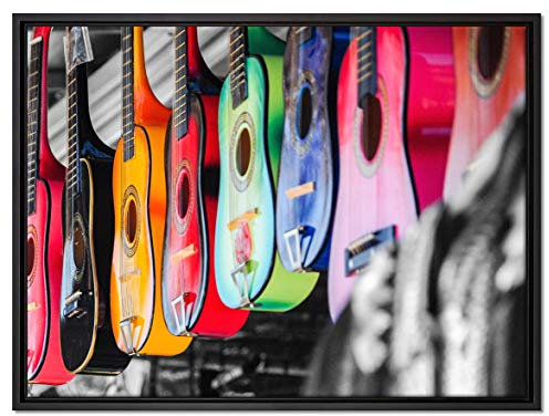 Pixxprint Klassische Gitarren auf dem Markt Leinwandbild 80x60 cm im Bilderahmen, Wandbild, Schattenfugenrahmen, Kein Poster