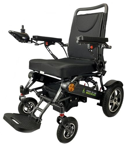 Heavy Duty Aluminium Electric Wheelchair Powerchair Folding Carbon Fibre Effect by Free To Be Mobility Equipment 2 x Battery Supplied 700W Motors.