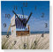 Wallario Design Wanduhr Strandkorb aus Aluverbund, Alu-Uhr Größe 30 x 30 cm, Schwarze Zeiger mit Metalloptik