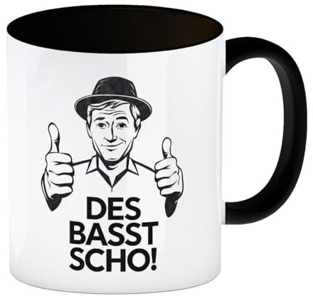 Mann mit Daumen hoch Des basst scho Kaffeebecher in schwarz Humorvolle Tasse für Büro und Alltag - lustiger Spruch