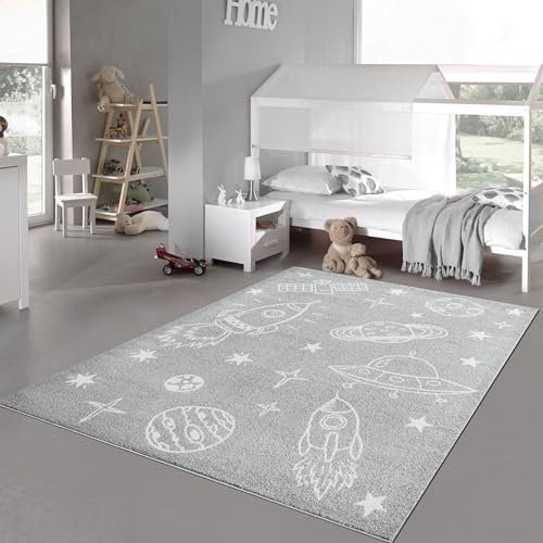 Teppich-Traum Grauer Weltraum-Spielteppich mit weißen Raumschiffen und Planeten für Kinderzimmerabenteuer Größe 80 x 150 cm