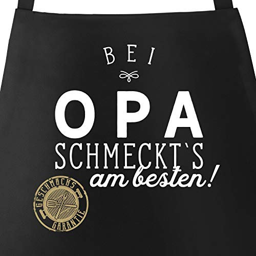 MoonWorks Grill-Schürze Küchenschürze mit Spruch Bei (style_variation) schmeckt`s am besten grillen kochen Baumwoll-Schürze Küchenschürze schwarz unisize